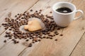 Cup of coffe and Frame-heart from coffee beans and two cookies-heart Royalty Free Stock Photo