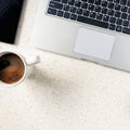 cup of coffee on the table with grapefruit and laptop Royalty Free Stock Photo