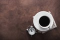 Cup of coffee with alarm clock Royalty Free Stock Photo