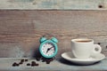 Cup of coffee with alarm clock Royalty Free Stock Photo