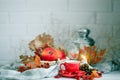 Cup of coffee, apples and autumn leaves on a wooden table. Autumn background.