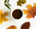 A cup of coffee with autumn yellow leaves. Composition with natural materials. Autumn composition with coffee