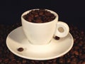 Cup of coffee beans Royalty Free Stock Photo