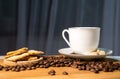 Cup of coffee, beans and biscuits Royalty Free Stock Photo