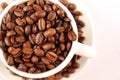 Cup of coffee beans Royalty Free Stock Photo