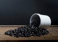 Cup Coffee beans in Cloth bag on black Backgroud Royalty Free Stock Photo