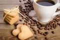 cup of coffee, beans and cookies-hearts related toget Royalty Free Stock Photo