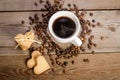 The cup of coffee, coffee beans and cookies-hearts related together Royalty Free Stock Photo