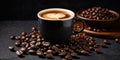 Cup of coffee and beans over black slate stone background Royalty Free Stock Photo