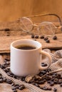 Cup of coffee with beans vintage still life Royalty Free Stock Photo