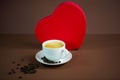 Cup of coffee with big red heart in the background Royalty Free Stock Photo