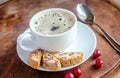 A cup of coffee with biscotti Royalty Free Stock Photo