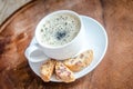 A cup of coffee with biscotti Royalty Free Stock Photo