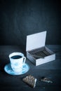 Cup of coffee, biscuits and a box of cigarettes Royalty Free Stock Photo