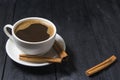 Cup of coffee on wooden table