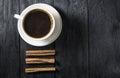 Cup of coffee on wooden table