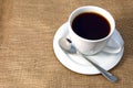 Cup of coffee on burlap Royalty Free Stock Photo