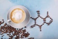 A cup of coffee with caffeine molecule created by coffee beans Royalty Free Stock Photo