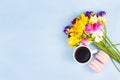 Cup of coffee, cakes and flowers. Coffee and flowers copy space