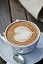 cup of coffee , cappuccino heart design