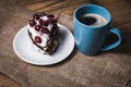 Cup of coffee and cherry cake Royalty Free Stock Photo