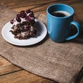 Cup of coffee and cherry cake Royalty Free Stock Photo