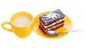 Cup of coffee and chocolate cake on orange plate Royalty Free Stock Photo