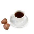 Cup of coffee and chocolate candies isolated on white Royalty Free Stock Photo