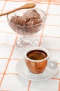 Cup of coffee and chocolate ice cream served on the table