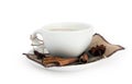 Cup of coffee with cinnamon sticks and star anise on a sackcloth Royalty Free Stock Photo