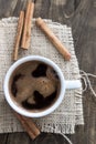 Cup of coffee with cinnamon sticks Royalty Free Stock Photo