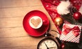 Cup of coffee, clock and christmas decorations Royalty Free Stock Photo