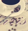 Cup of coffee and coffee beans. Royalty Free Stock Photo