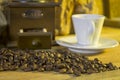 Cup of coffee, coffee-beans, coffee grinder, coffee sack Royalty Free Stock Photo