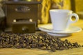 Cup of coffee, coffee-beans, coffee grinder, coffee sack Royalty Free Stock Photo