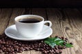 Cup of coffee with coffee beans Royalty Free Stock Photo