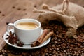 Cup Of Coffee And Coffee Beans On Table. Royalty Free Stock Photo