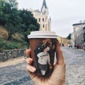 Cup of coffee in cold city Kiev near castle of Richard