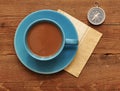 Cup of coffee and compass Royalty Free Stock Photo