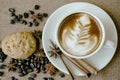 Cup of coffee and cookie in coffee shop Royalty Free Stock Photo