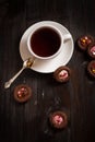 Cup of coffee and cookie on wood table Royalty Free Stock Photo