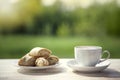 Cup of coffee and cookie on wooden table in the summer garden. Royalty Free Stock Photo