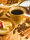Cup of coffee, cookies, coffee beans and cinnamon close-up Royalty Free Stock Photo