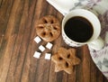 Cup of coffee cookies wooden board, sweater, sugar, care, cozy, breakfast Royalty Free Stock Photo