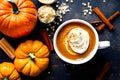 Cup of coffee with creamy side of cinnamon and pumpkin peels