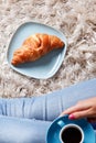 A cup of coffee and a croissant Royalty Free Stock Photo