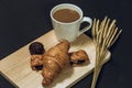 Cup of coffee with croissant. Royalty Free Stock Photo