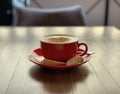 Cup of coffee cuppuccino on wooden table Royalty Free Stock Photo