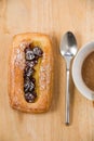 Cup of coffee and danish pastry. Royalty Free Stock Photo