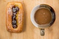 Cup of coffee and danish pastry. Royalty Free Stock Photo